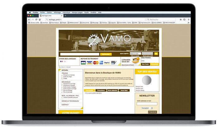 Aperçu du site Outillages VAMO affiché sur un ordinateur portable Apple – boutique en ligne d’outillage professionnel
