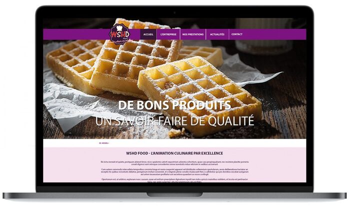 Visuel du site animation-soiree-entreprise.eu présenté sur un ordinateur portable Apple, design dynamique et gourmand