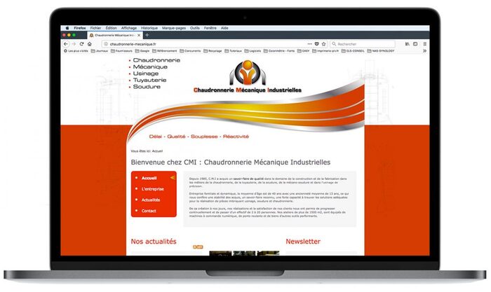 Visuel du site de CMI affiché sur un ordinateur portable Apple – chaudronnerie, usinage et mécano-soudure