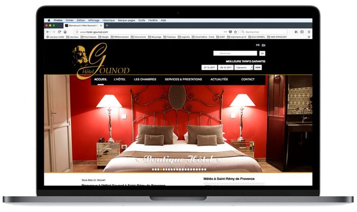 Vue de la page d’accueil du site Hôtel Gounod affichée sur un ordinateur portable Apple — hôtel de charme à Saint-Rémy-de-Provence
