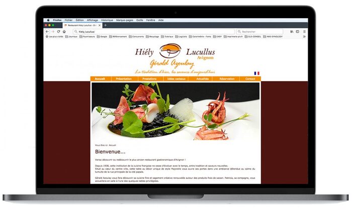 Page d’accueil du site du restaurant Hiély Lucullus affichée sur un ordinateur portable Apple