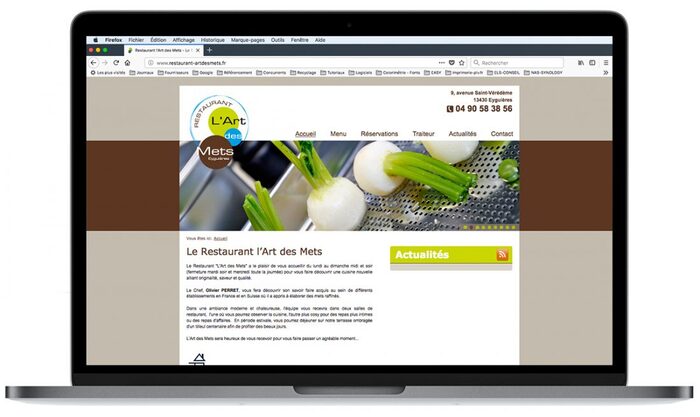 Aperçu du site du restaurant L’Art des Mets sur un ordinateur portable Apple – restaurant provençal à Eyguières, Alpilles